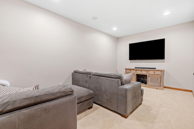 9256 Gateway Ln, Eden Prairie, MN 55347 - living area featuring light colored carpet, recessed lighting, and baseboards