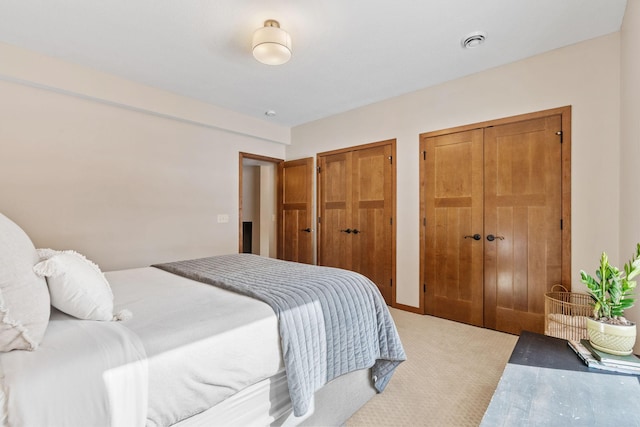 9256 Gateway Ln, Eden Prairie, MN 55347 - carpeted bedroom with two closets