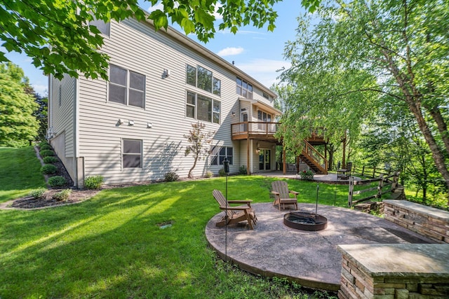 9256 Gateway Ln, Eden Prairie, MN 55347 - back of property with a fire pit, stairs, a patio, a deck, and a yard