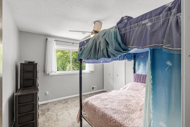 1989 Park Dr, Saint Paul, MN 55119 - bedroom featuring carpet flooring, a textured ceiling, and a ceiling fan