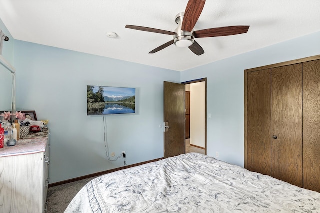 1989 Park Dr, Saint Paul, MN 55119 - bedroom featuring a closet, carpet floors, and a ceiling fan