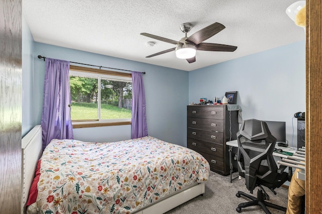 1989 Park Dr, Saint Paul, MN 55119 - bedroom featuring carpet flooring, a textured ceiling, ceiling fan, and an office area
