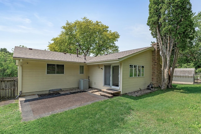 1989 Park Dr, Saint Paul, MN 55119 - rear view of house with a patio
