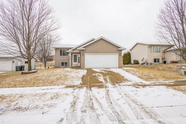 5219 56th Ave NW, Rochester, MN 55901 - view of front of home featuring an attached garage and driveway