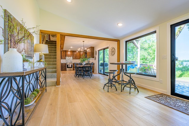 21400 654th Ave, Darwin, MN 55324 - entryway featuring lofted ceiling, light wood-style floors, stairway, plenty of natural light, and recessed lighting