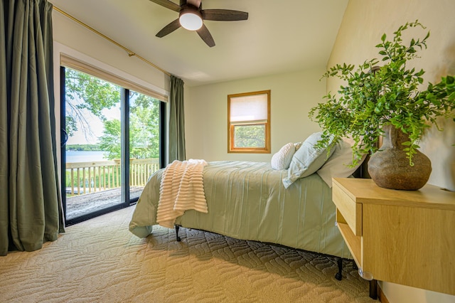 21400 654th Ave, Darwin, MN 55324 - carpeted bedroom featuring access to outside, a water view, and ceiling fan