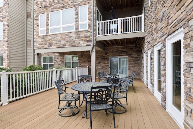 2670 Kelley Pkwy Unit 115, Orono, MN 55356 - deck featuring outdoor dining area