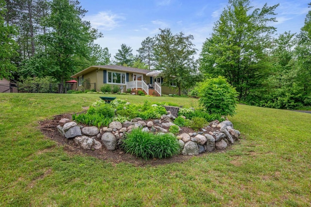 1501 Fraser Dr, Grand Rapids, MN 55744 - view of yard featuring a deck and stairs
