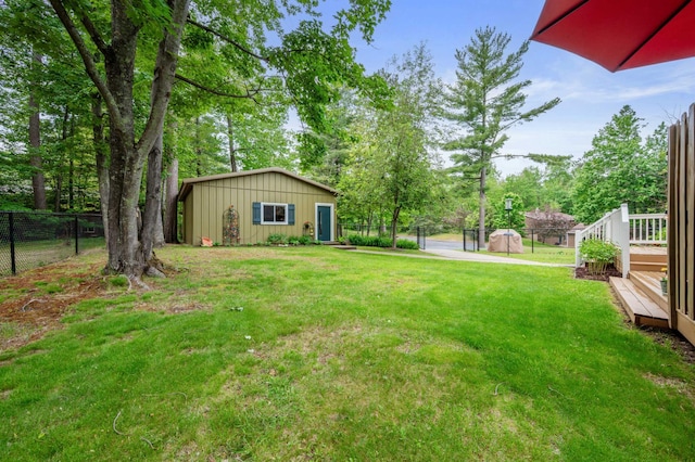 1501 Fraser Dr, Grand Rapids, MN 55744 - view of yard featuring a wooden deck and view of scattered trees
