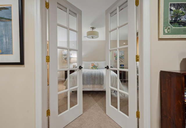 1501 Fraser Dr, Grand Rapids, MN 55744 - entryway with french doors and carpet flooring