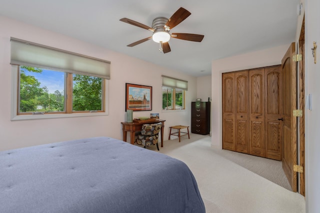 1501 Fraser Dr, Grand Rapids, MN 55744 - bedroom featuring light colored carpet and ceiling fan