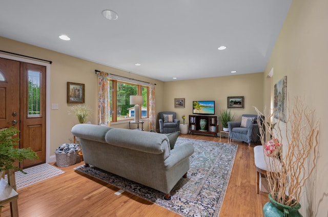 1501 Fraser Dr, Grand Rapids, MN 55744 - living room featuring light wood-style flooring, recessed lighting, and baseboards