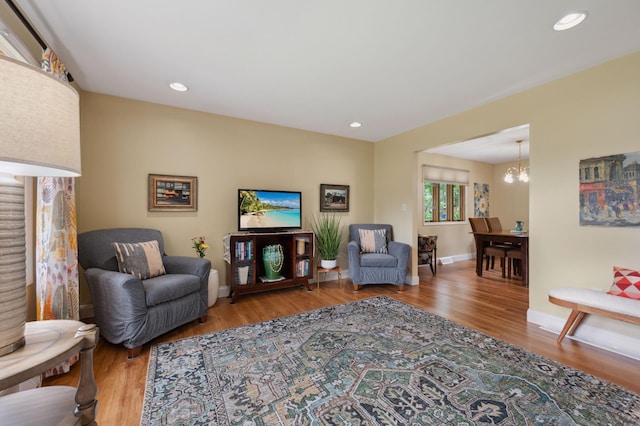 1501 Fraser Dr, Grand Rapids, MN 55744 - living area with wood finished floors, a chandelier, baseboards, and recessed lighting