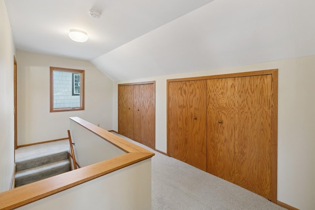 5409 Aldrich Ave S, Minneapolis, MN 55419 - hall featuring carpet floors, an upstairs landing, and vaulted ceiling
