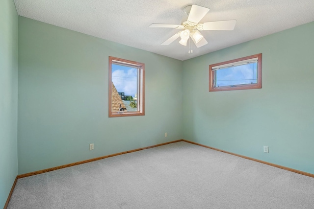 5409 Aldrich Ave S, Minneapolis, MN 55419 - empty room with carpet flooring, a textured ceiling, and a ceiling fan