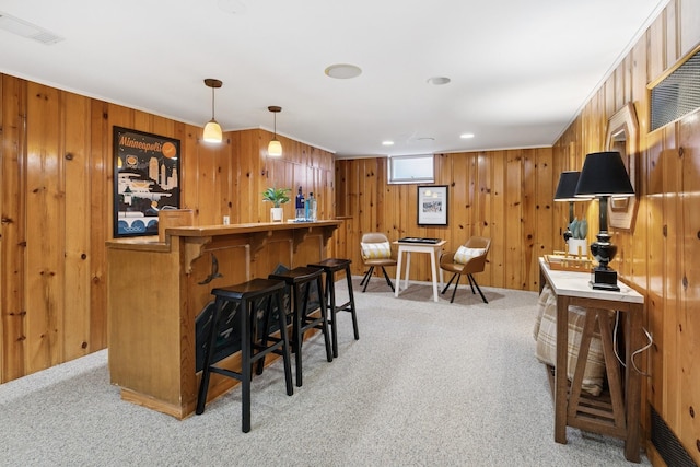 5409 Aldrich Ave S, Minneapolis, MN 55419 - indoor dry bar with light colored carpet, wood walls, decorative light fixtures, and recessed lighting