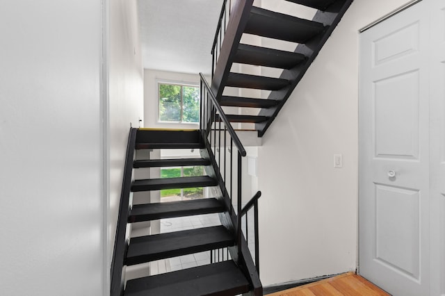 4100 Meadowlark Ln Unit 24100, Eagan, MN 55122 - stairs with wood finished floors