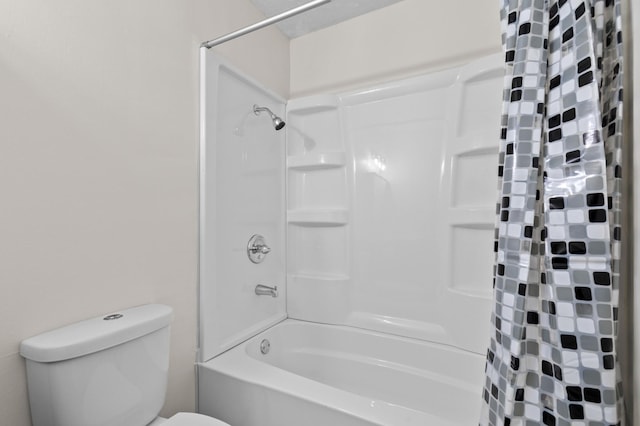 4100 Meadowlark Ln Unit 24100, Eagan, MN 55122 - bathroom featuring shower / tub combo with curtain and toilet