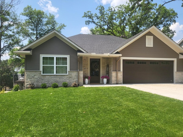 2401 Goldfinch Ln, Buffalo, MN 55313 - view of front of property featuring stone siding, a front lawn, a garage, driveway, and roof with shingles