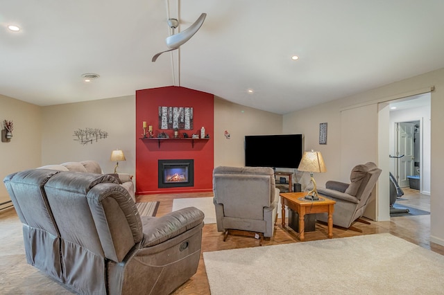 38630 Woodview Ln, Le Center, MN 56057 - living room with a glass covered fireplace, vaulted ceiling, and recessed lighting