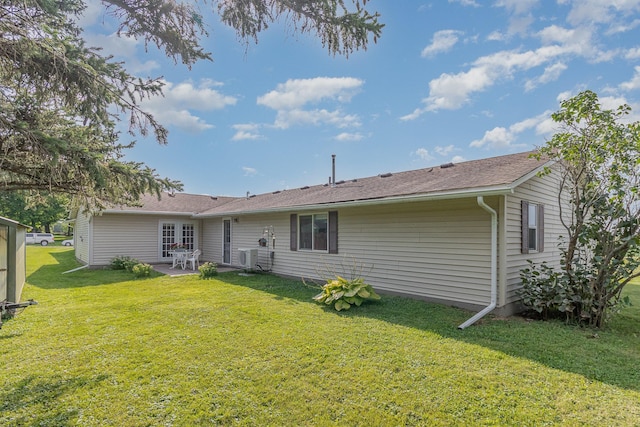 38630 Woodview Ln, Le Center, MN 56057 - rear view of house with a patio and a lawn