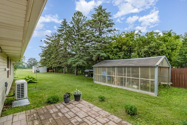 38630 Woodview Ln, Le Center, MN 56057 - view of yard featuring a patio and a shed