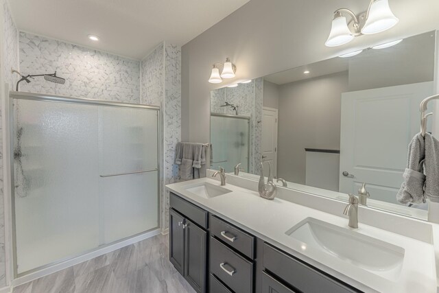 8799 Irving Blvd N, Lake Elmo, MN 55042 - full bath featuring a stall shower and double vanity