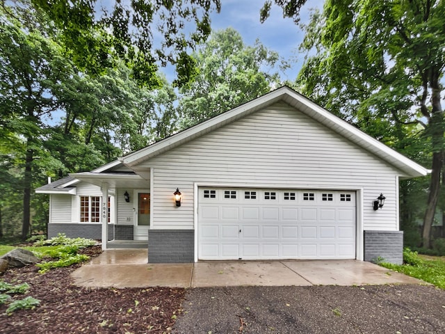 7040 Winfield Rd, Rockford, MN 55373 - view of front of property with brick siding and asphalt driveway