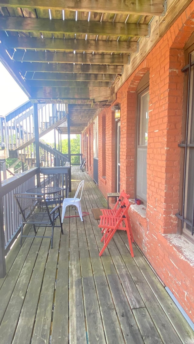 703 Laurel Ave Unit 4W, Saint Paul, MN 55104 - wooden terrace featuring stairway