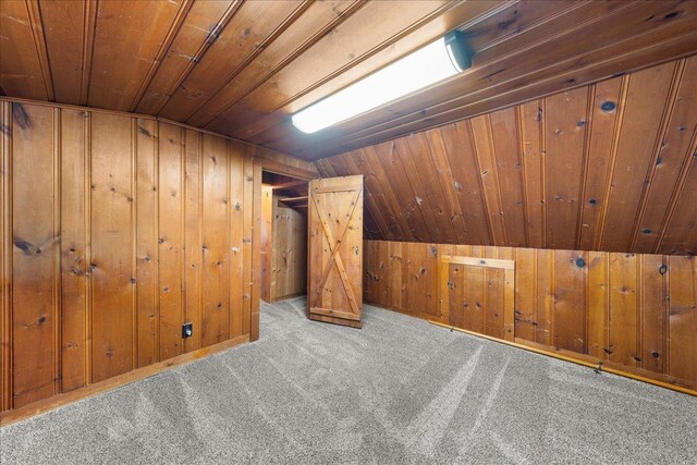 1334 105th Ave, Amery, WI 54001 - bonus room with carpet flooring, wooden ceiling, wooden walls, and vaulted ceiling