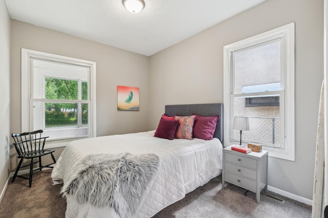 2619 23rd Ave N, Minneapolis, MN 55411 - carpeted bedroom with baseboards