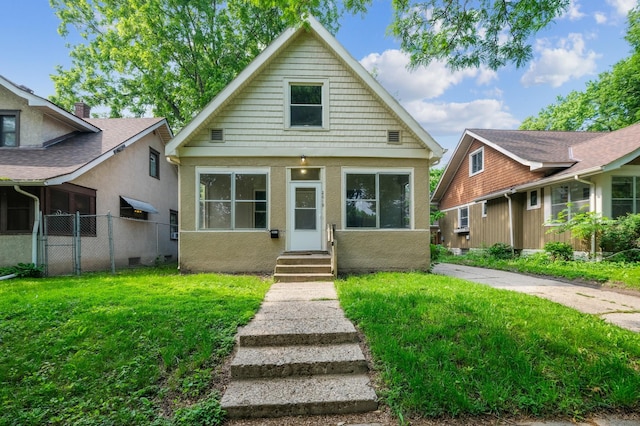 2619 23rd Ave N, Minneapolis, MN 55411 - bungalow featuring entry steps and stucco siding