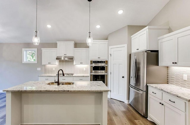 12620 Overlook Rd, Dayton, MN 55327 - kitchen featuring appliances with stainless steel finishes, backsplash, light wood-type flooring, white cabinetry, and a sink