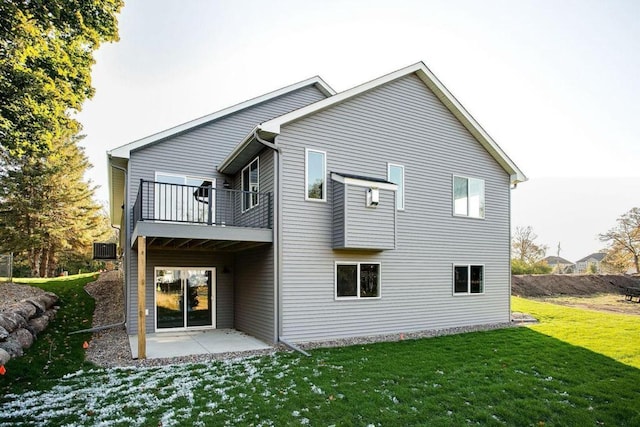 12620 Overlook Rd, Dayton, MN 55327 - back of house with a balcony, a patio, a yard, and central AC