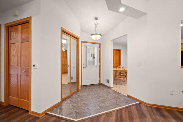 9479 Prairieview Trl N, Champlin, MN 55316 - foyer featuring baseboards, wood finished floors, and recessed lighting