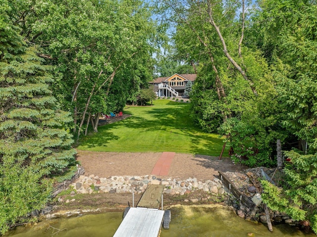 22946 185th St NW, Orrock Twp, MN 55309 - view of grassy yard featuring a dock