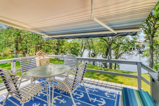 45909 Lands End Rd, Vergas, MN 56587 - wooden terrace featuring outdoor dining area and a lawn