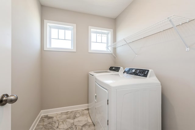 8335 Lander Ave NE, Otsego, MN 55330 - laundry room with separate washer and dryer and baseboards