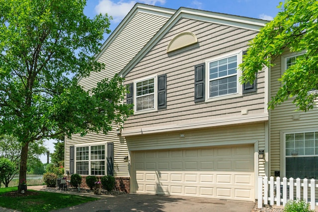 4505 Victor Path Unit 7, Hugo, MN 55038 - view of front of home featuring driveway and a garage