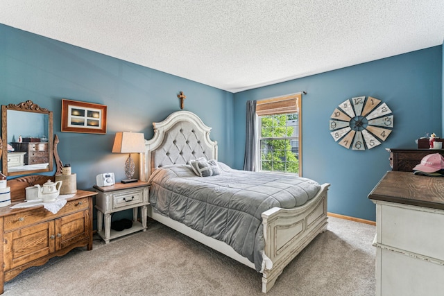 4505 Victor Path Unit 7, Hugo, MN 55038 - bedroom featuring carpet, a textured ceiling, and baseboards