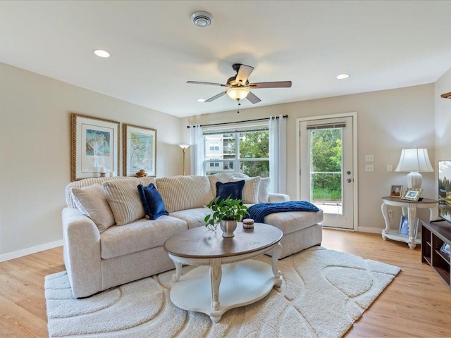 8025 Dalton Rd, Baxter, MN 56425 - living room with a ceiling fan, baseboards, light wood finished floors, and recessed lighting