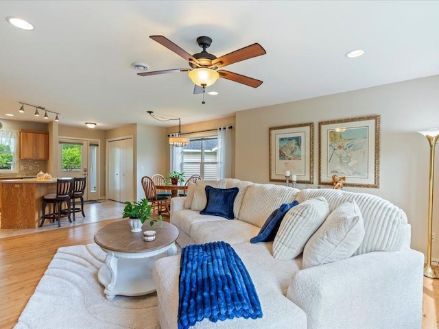 8025 Dalton Rd, Baxter, MN 56425 - living room with light wood-style flooring, healthy amount of natural light, a ceiling fan, and recessed lighting