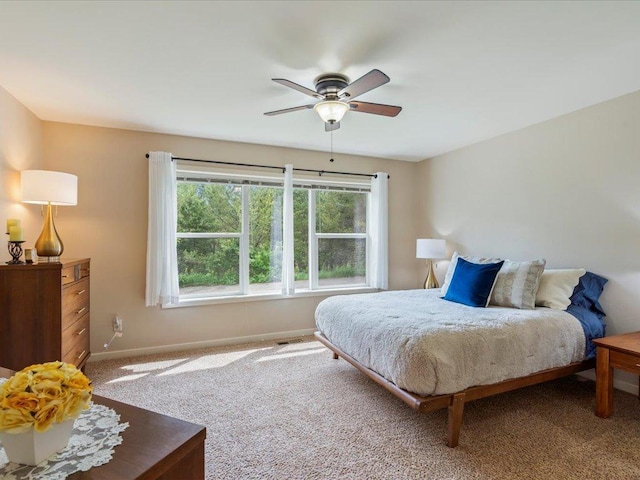 8025 Dalton Rd, Baxter, MN 56425 - bedroom featuring baseboards, carpet floors, and ceiling fan