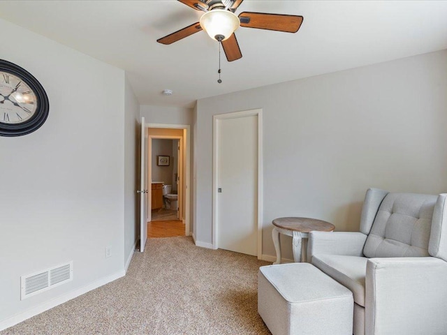 8025 Dalton Rd, Baxter, MN 56425 - living area with ceiling fan, light colored carpet, and baseboards