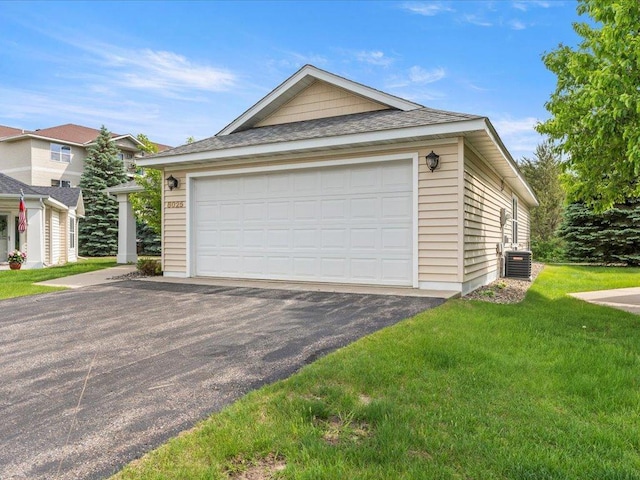 8025 Dalton Rd, Baxter, MN 56425 - detached garage featuring central AC unit