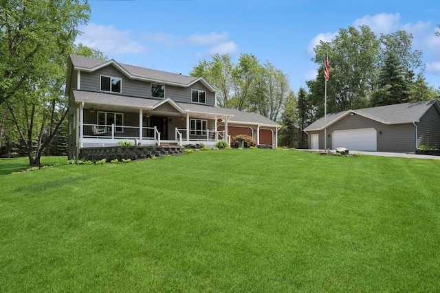 17575 Xenia St NW, Andover, MN 55304 - view of front of home with a detached garage, a porch, a front yard, and an outdoor structure