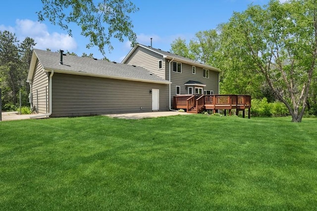 17575 Xenia St NW, Andover, MN 55304 - rear view of property with a wooden deck, a yard, a patio area, and roof with shingles
