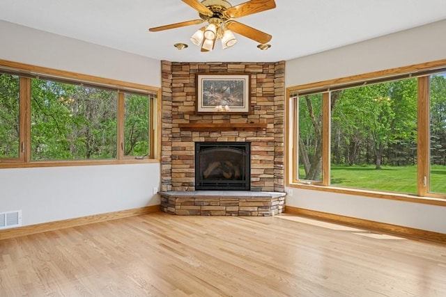 17575 Xenia St NW, Andover, MN 55304 - unfurnished living room with baseboards and healthy amount of natural light