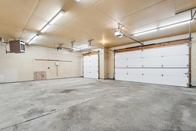 17575 Xenia St NW, Andover, MN 55304 - garage featuring a heating unit and a garage door opener