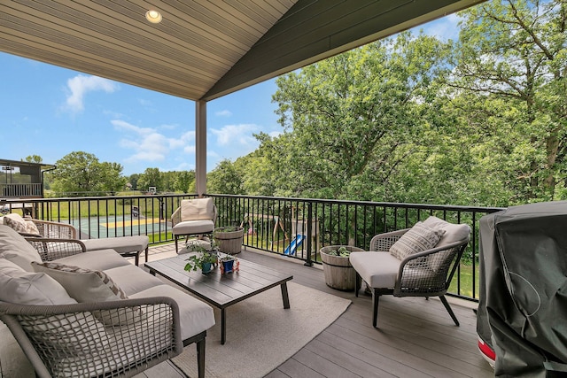 944 Cove Ct NW, Sauk Rapids, MN 56379 - wooden terrace featuring an outdoor living space and grilling area
